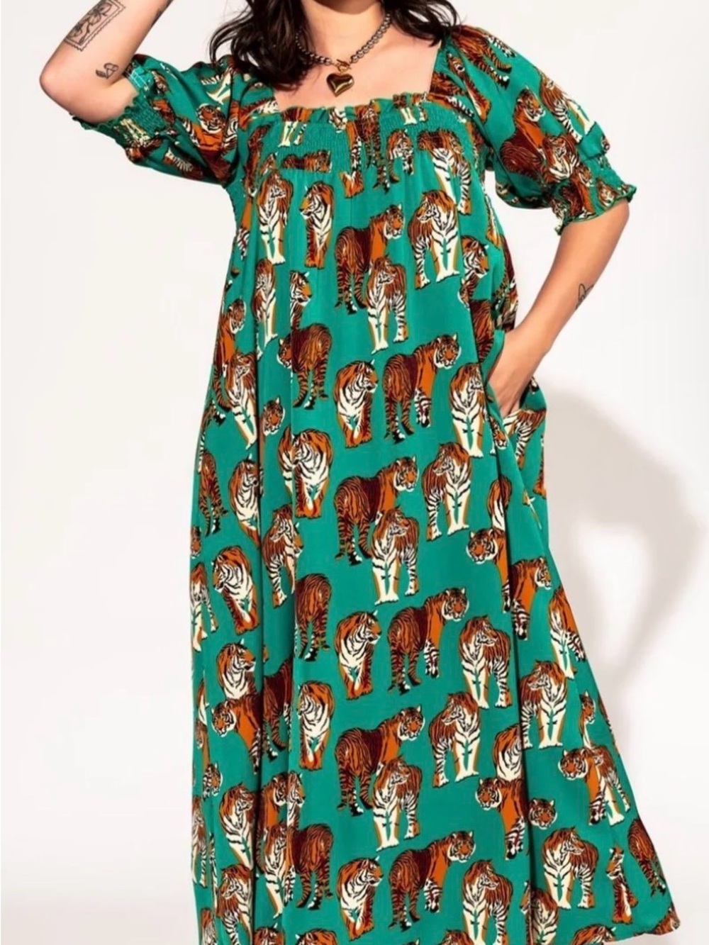 Dressed in LALA Palm Springs Smocked Dress in Tiger Tales